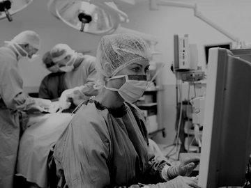 Female RN first assistant in the operating room